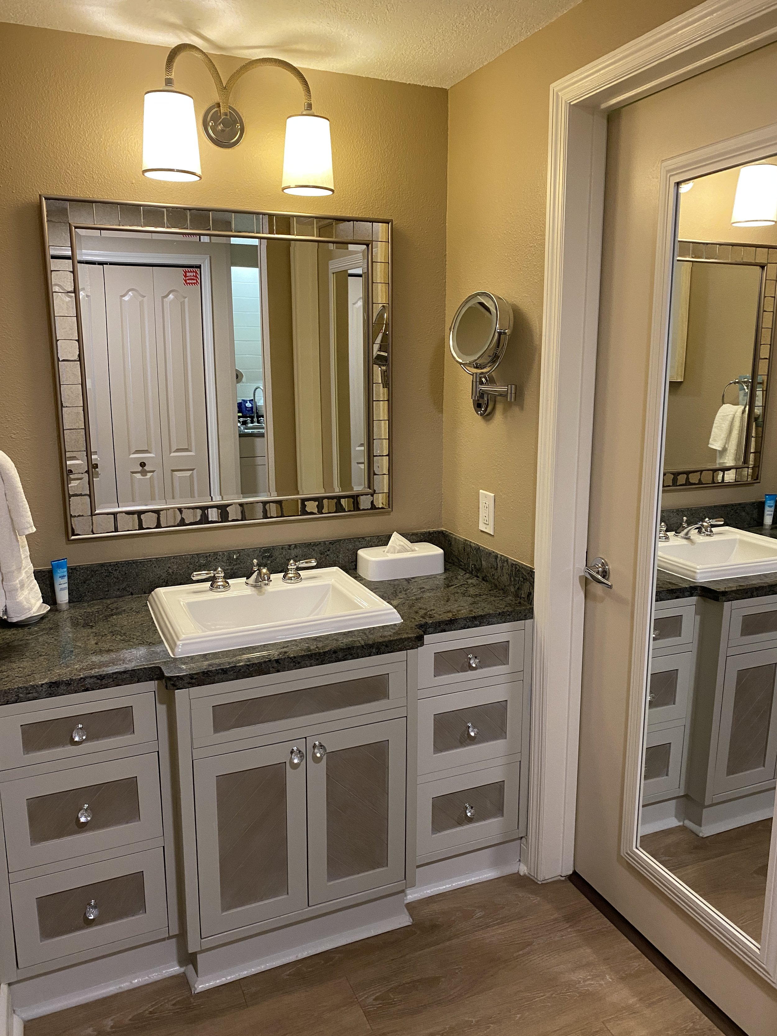  Single sink vanity with a spacious water closet and bathtub and shower.  
