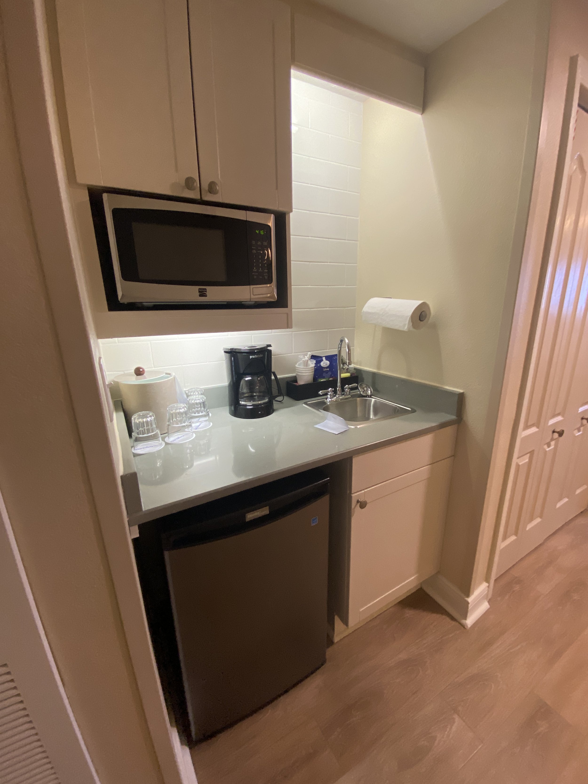  Rooms have a kitchenette with a microwave, mini-fridge and small sink.    The cupboards are stocked with plates, cups, glasses, bowls and utensils.    Most importantly, coffee is complimentary! It’s Joffrey’s Coffee - the same brand that’s provided 