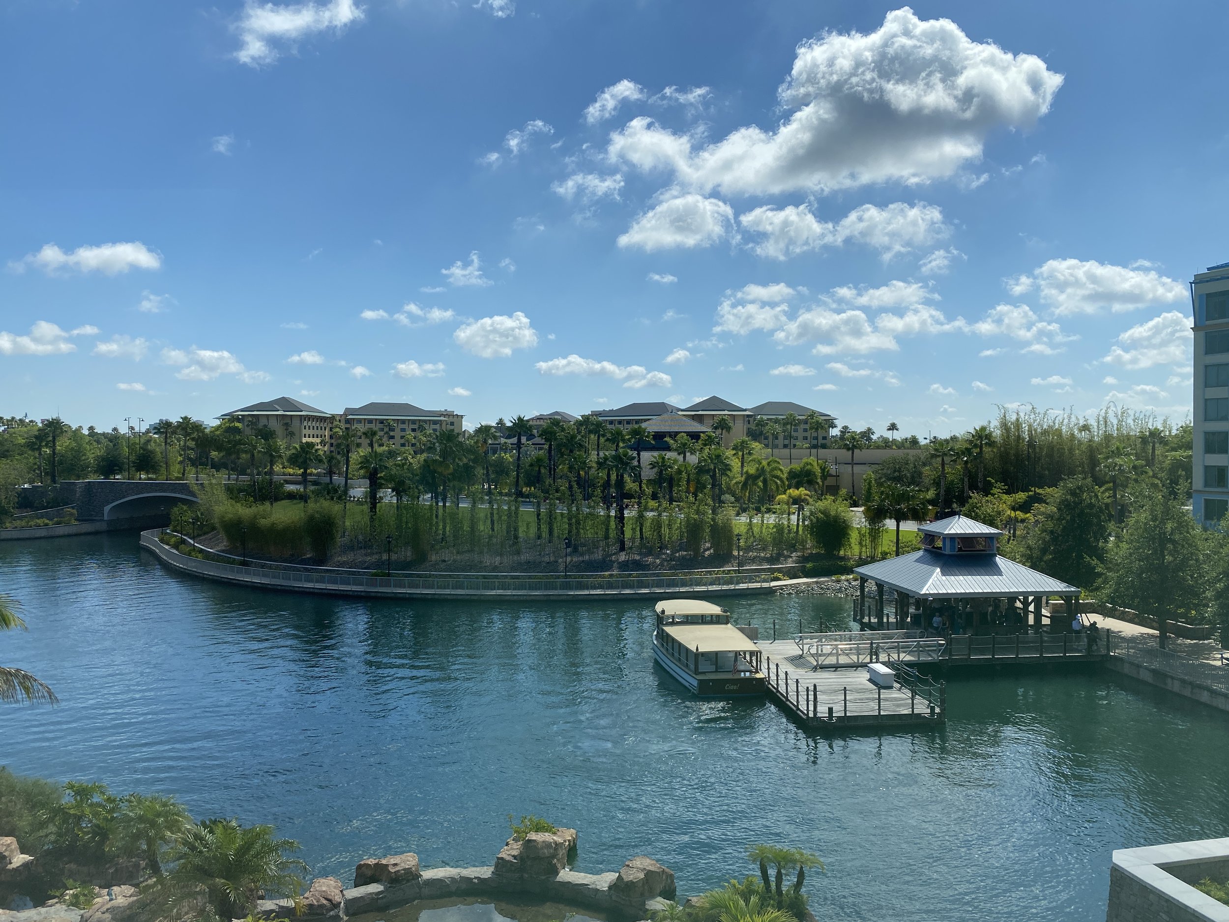  Complimentary boat transportation is provided to Universal City Walk, Islands of Adventure, and Universal Studios.  There is also a walking path.     It takes about 15 minutes to walk from Sapphire Falls to City Walk and the theme parks.     Bus tra