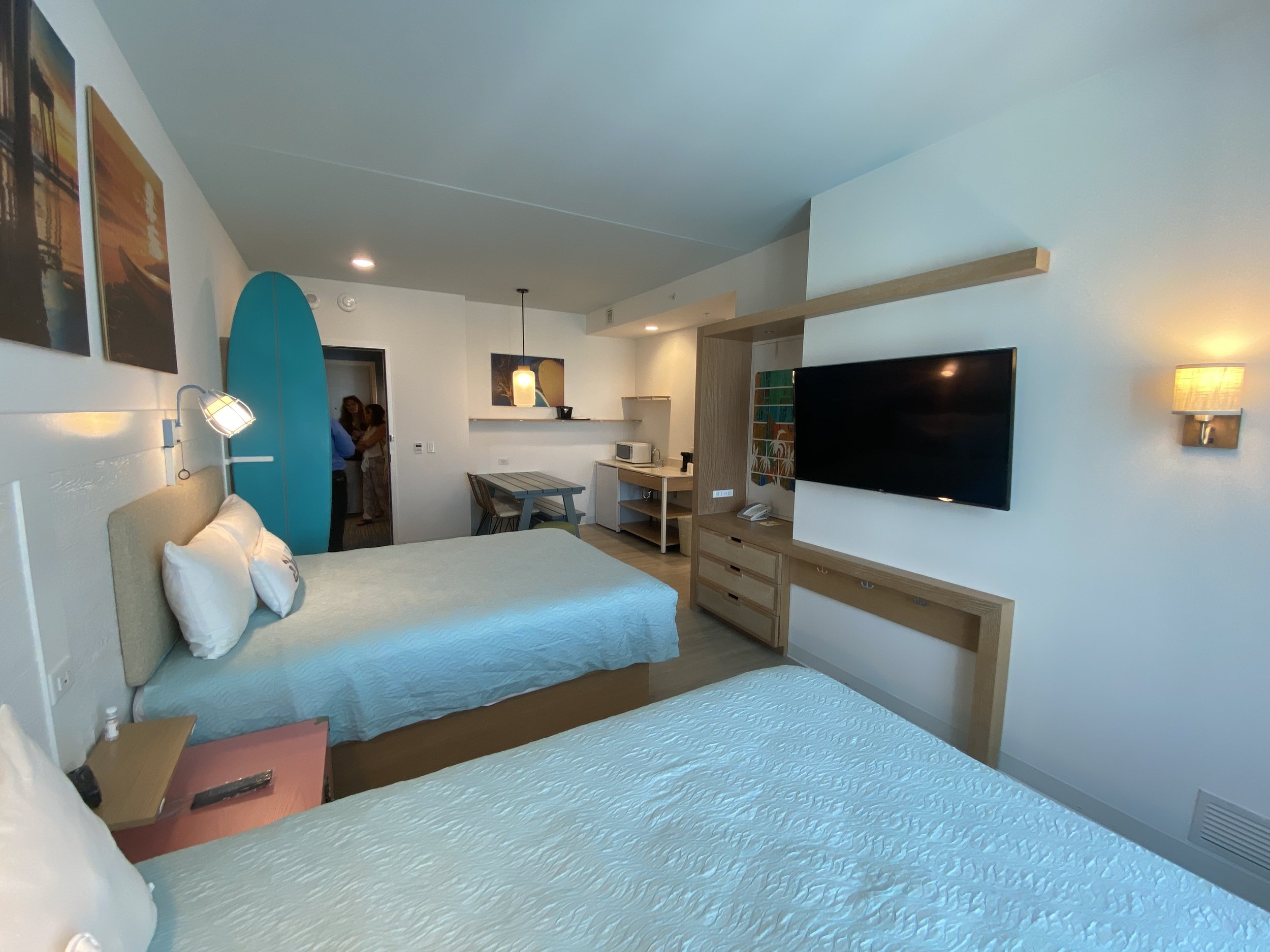  Two bedroom suites have an open area with 2 queen beds, a kitchenette, a dining area plus 1 separate bedroom. 