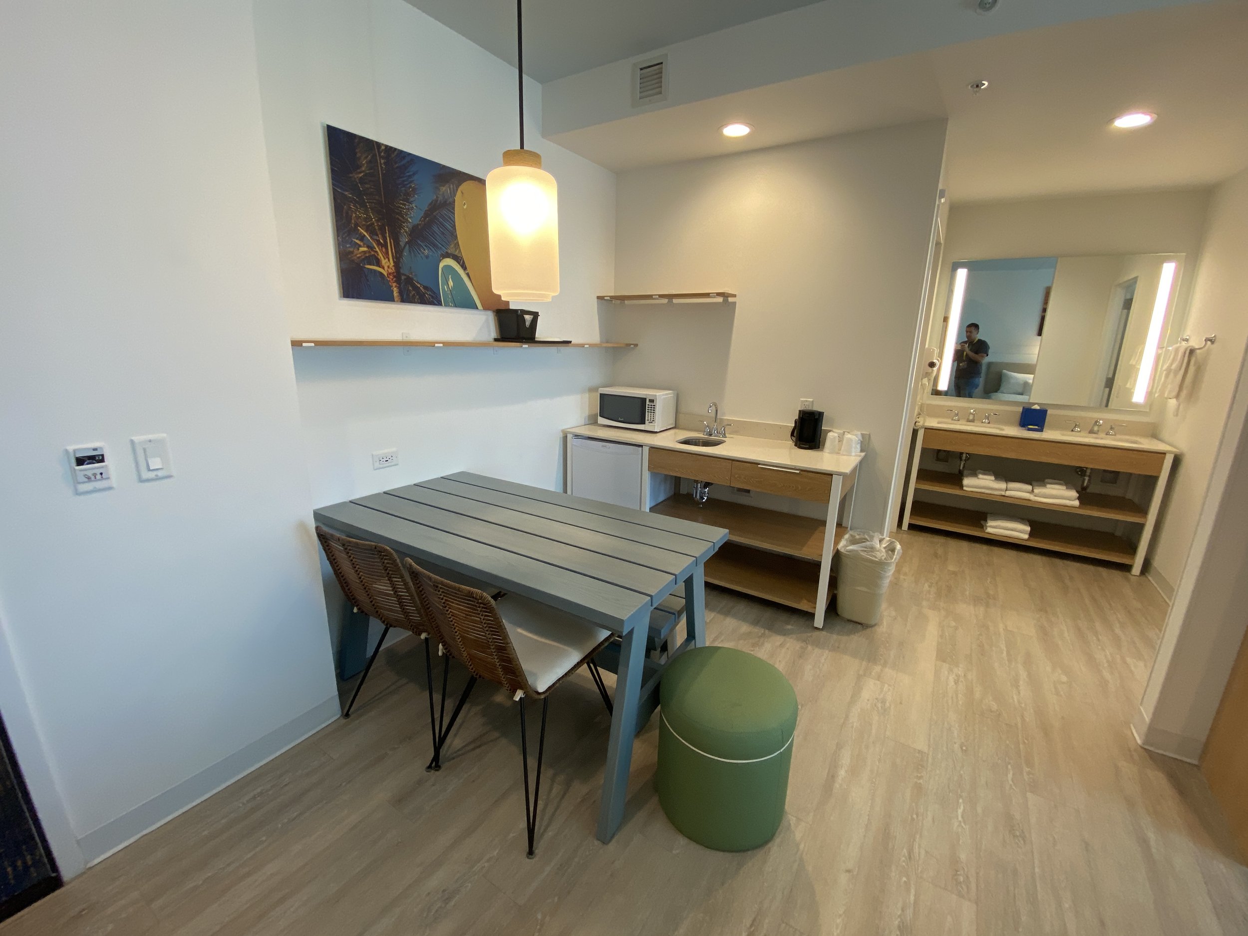  There is also a kitchenette area, a picnic table for meals and gathering, and a bathroom with separate bath and vanity areas so multiple people can get ready at once. 