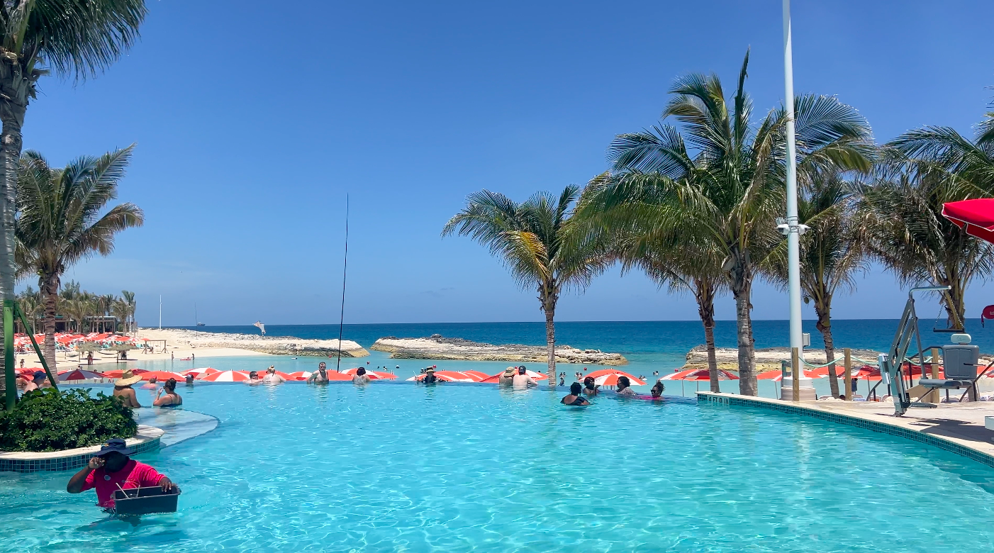 Infinity pool at hideaway beach showing the ocean off in the distance