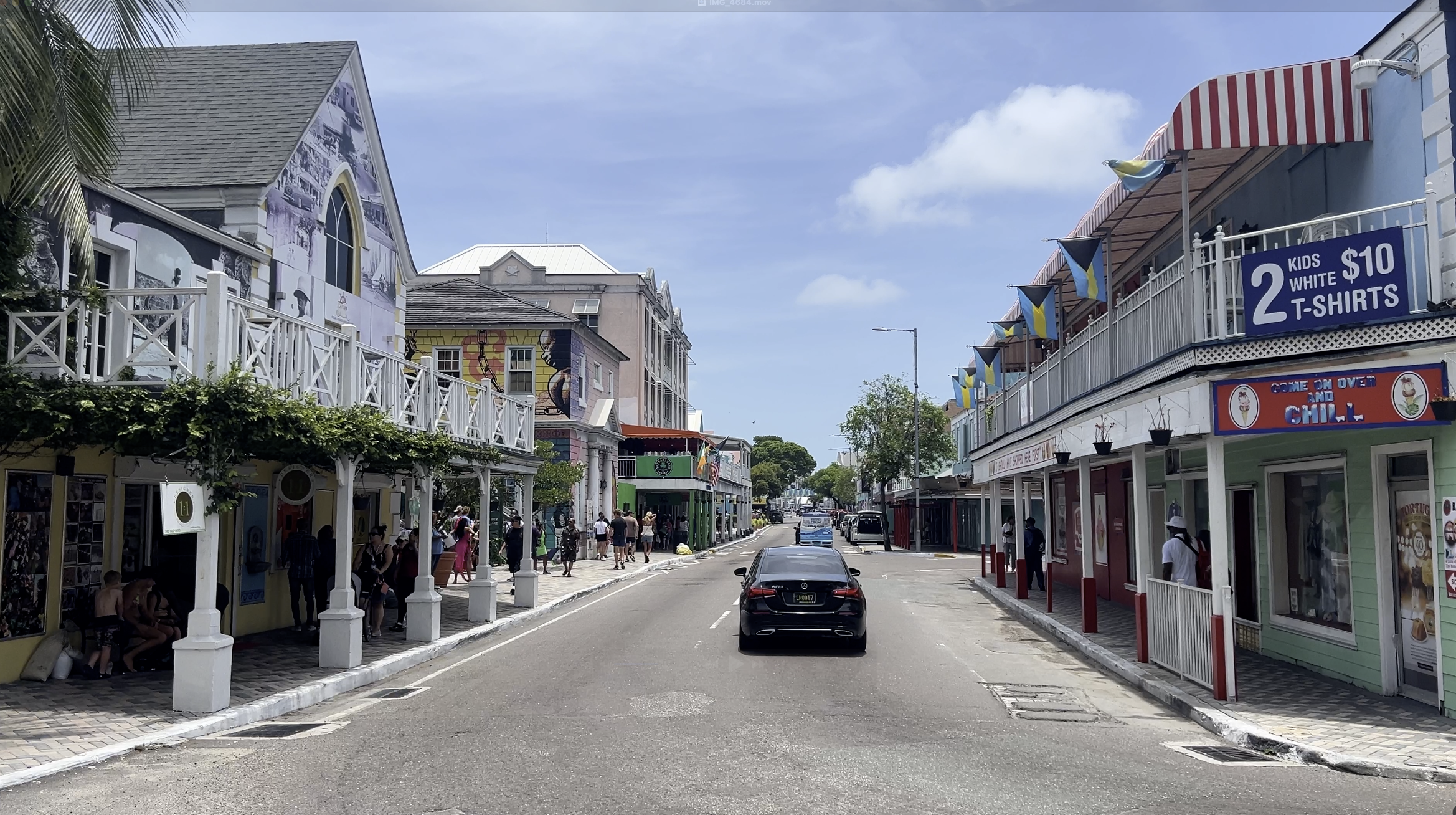 Shops on both sides of the street on Bay Street in Nassau Bahamas