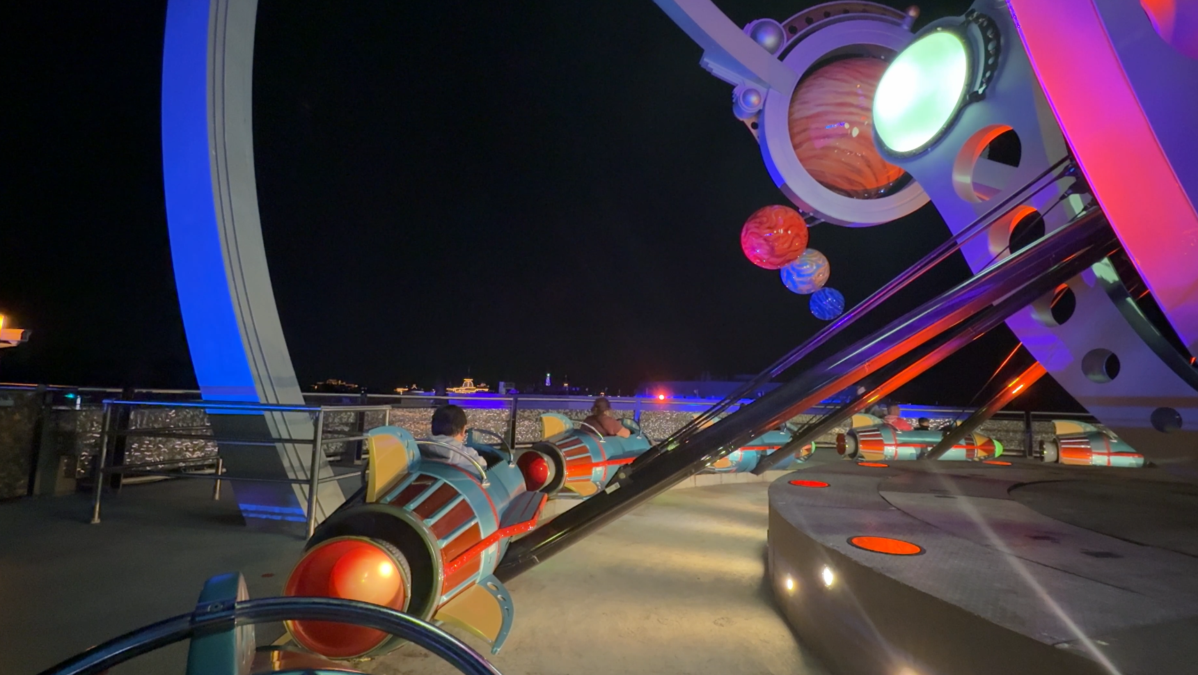 atro orbiter ride at night at magic kingdom park