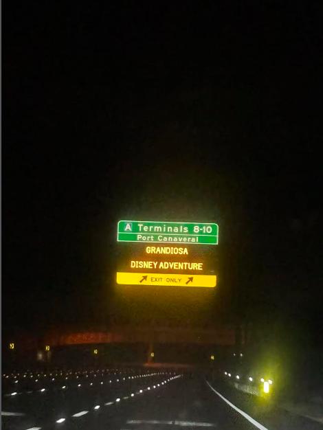 Sign in Port Canaveral directing guests to the Disney Adventure in Port Canaveral