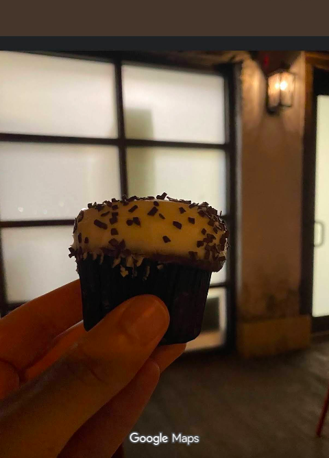 my tiny cupcake that cost $7 at Sprinkles Cupcakes at Disney Springs