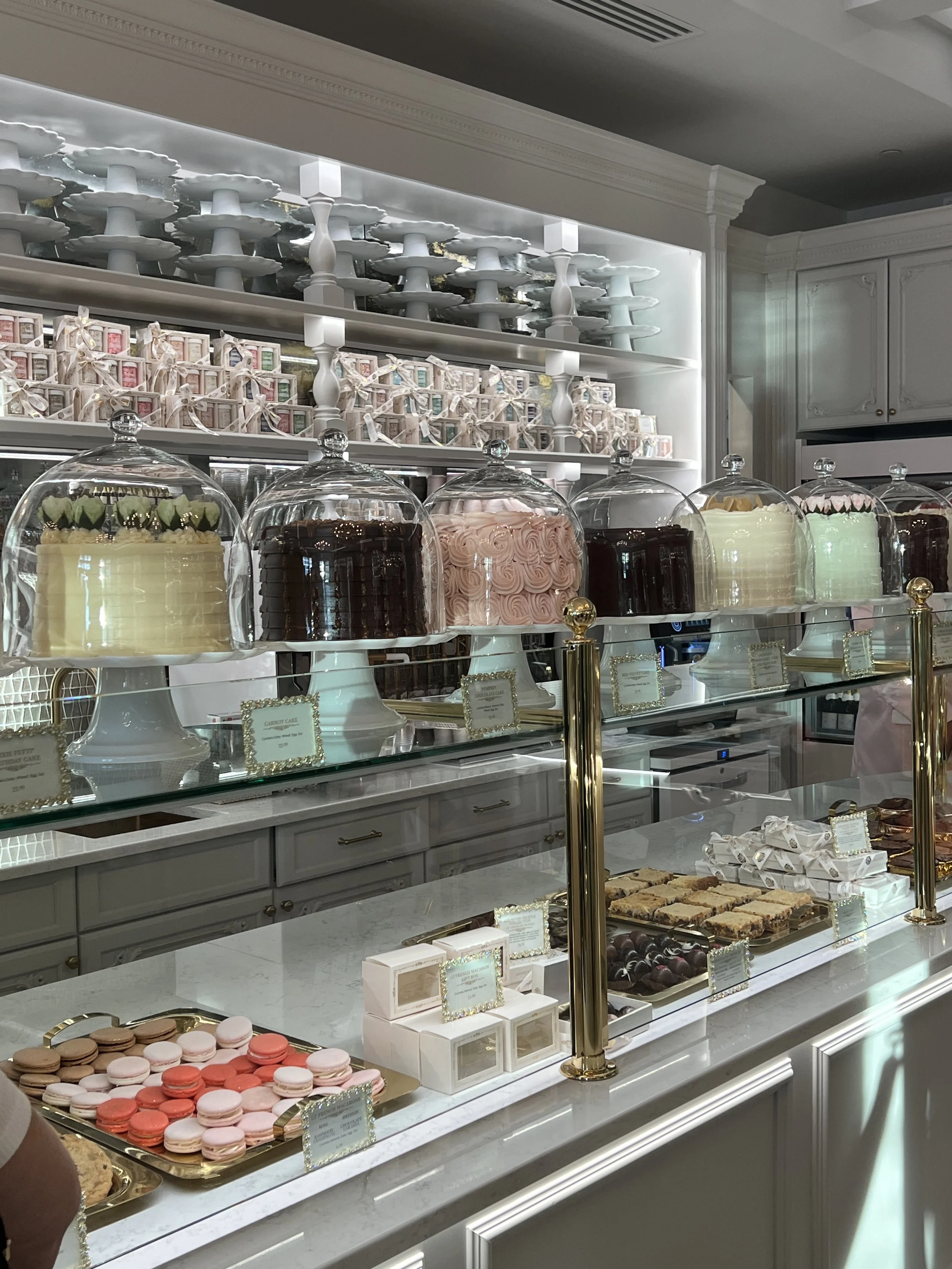 cake bake shop display of cakes and cookies