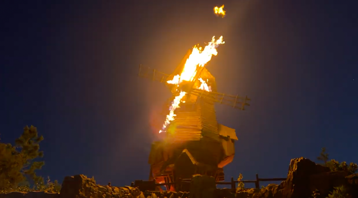 Burning Blade Tavern windmill catching on fire as part of the show at Epic Universe