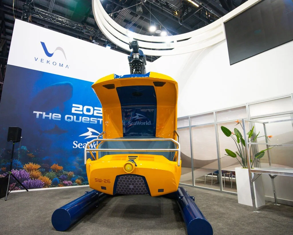 yellow ride vehicle that looks like a submersiable for Seaqust - coming to seaworld orlando in 2026