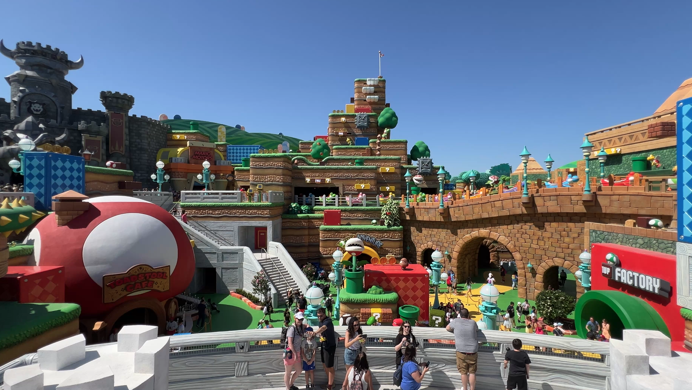 Entrance of super nintendo world at epic universe overlooking the entire land