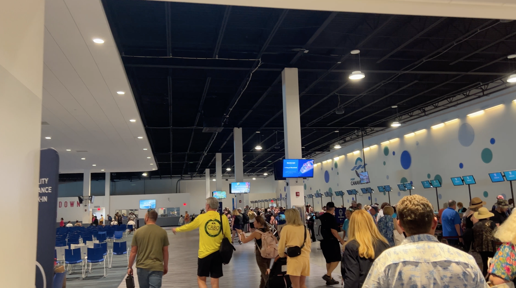 Passengers disembarking a royal caribbean ship in Port Canaveral