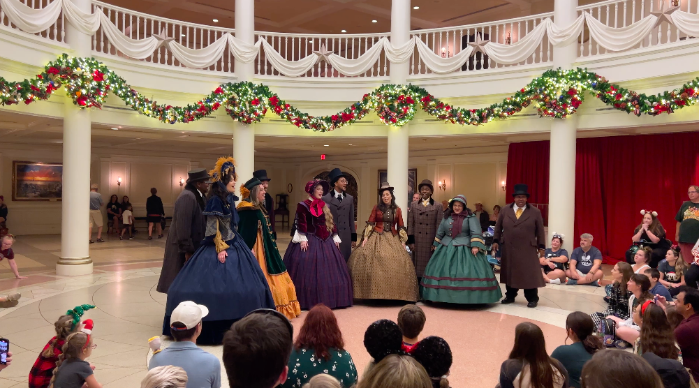 epcot voices of liberty at dickens carolers