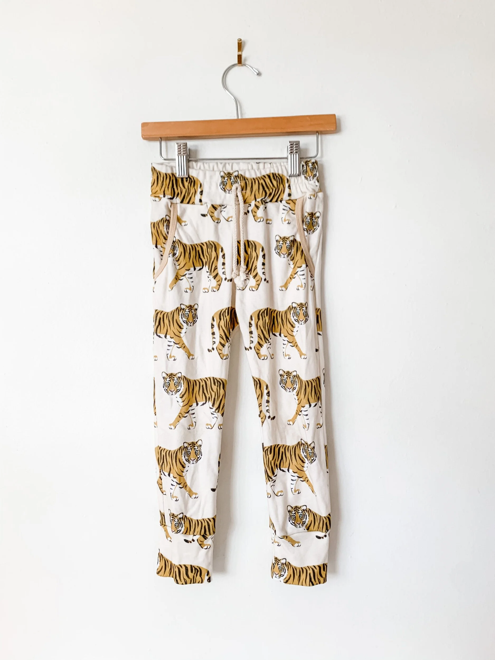joggers with white background and yellow tigers