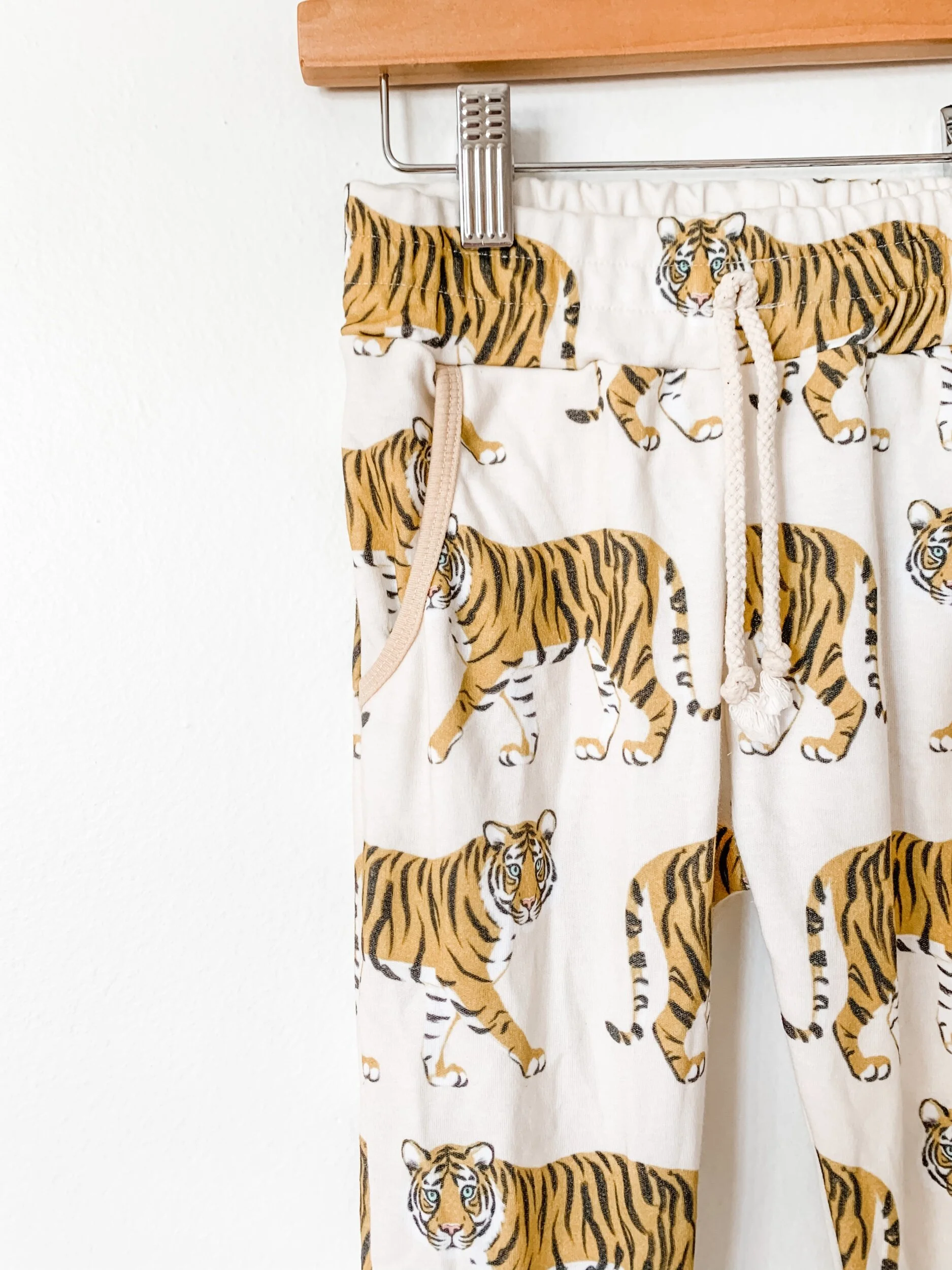 boys joggers with white background and yellow tigers