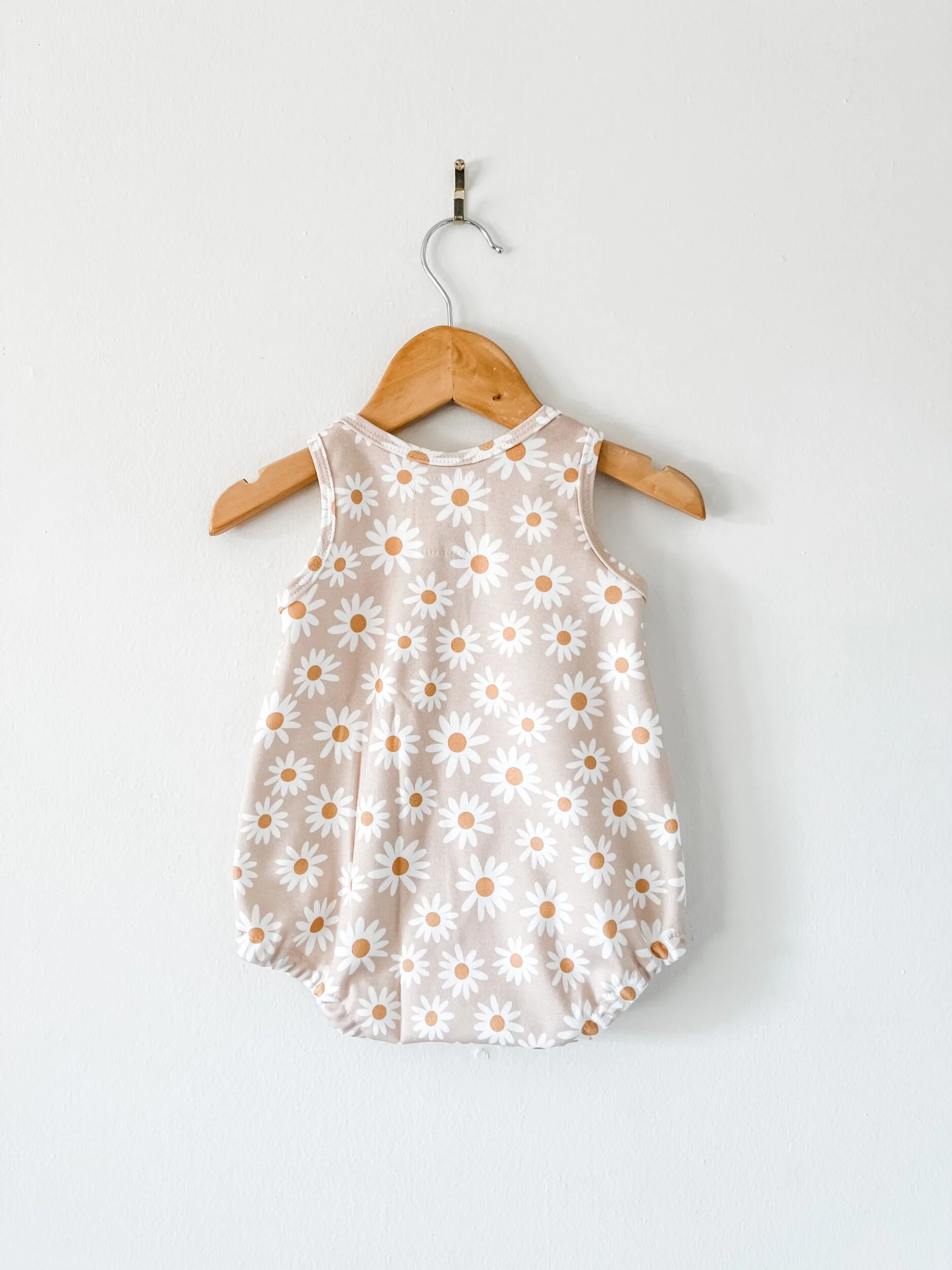 baby bubble romper in pinky beige daisy print
