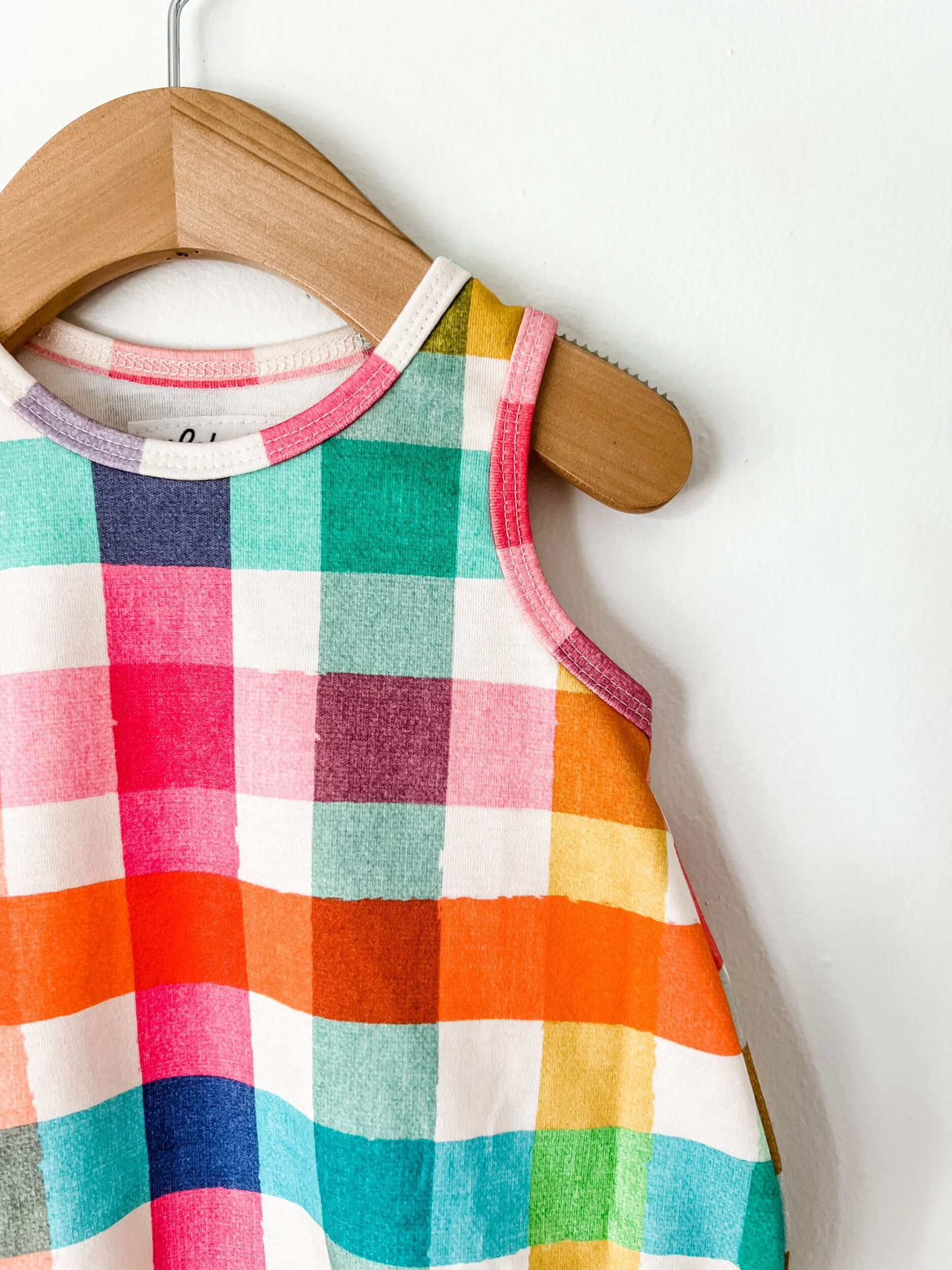 baby bubble romper in rainbow colored plaid