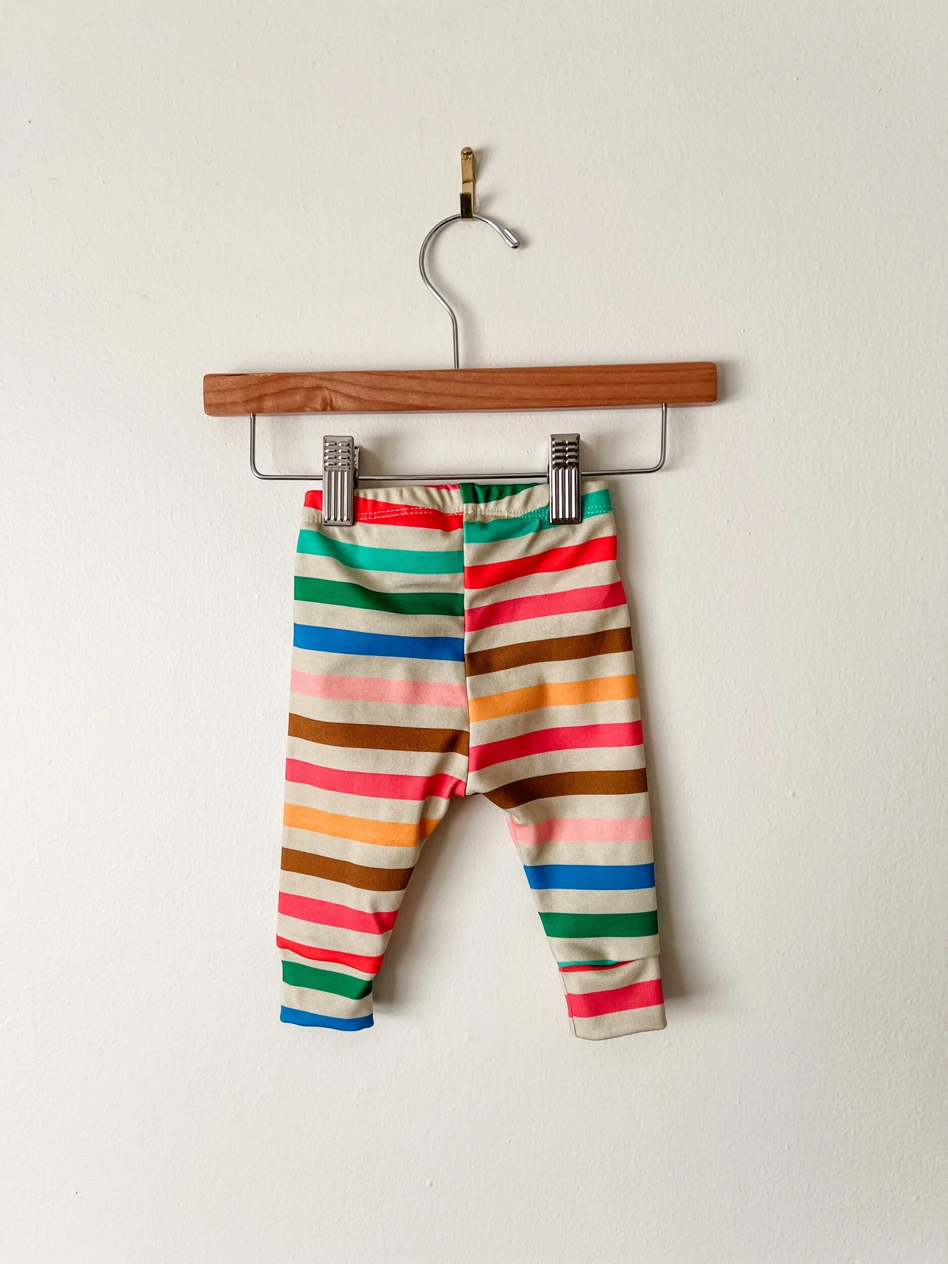 baby pants in rainbow colored stripes