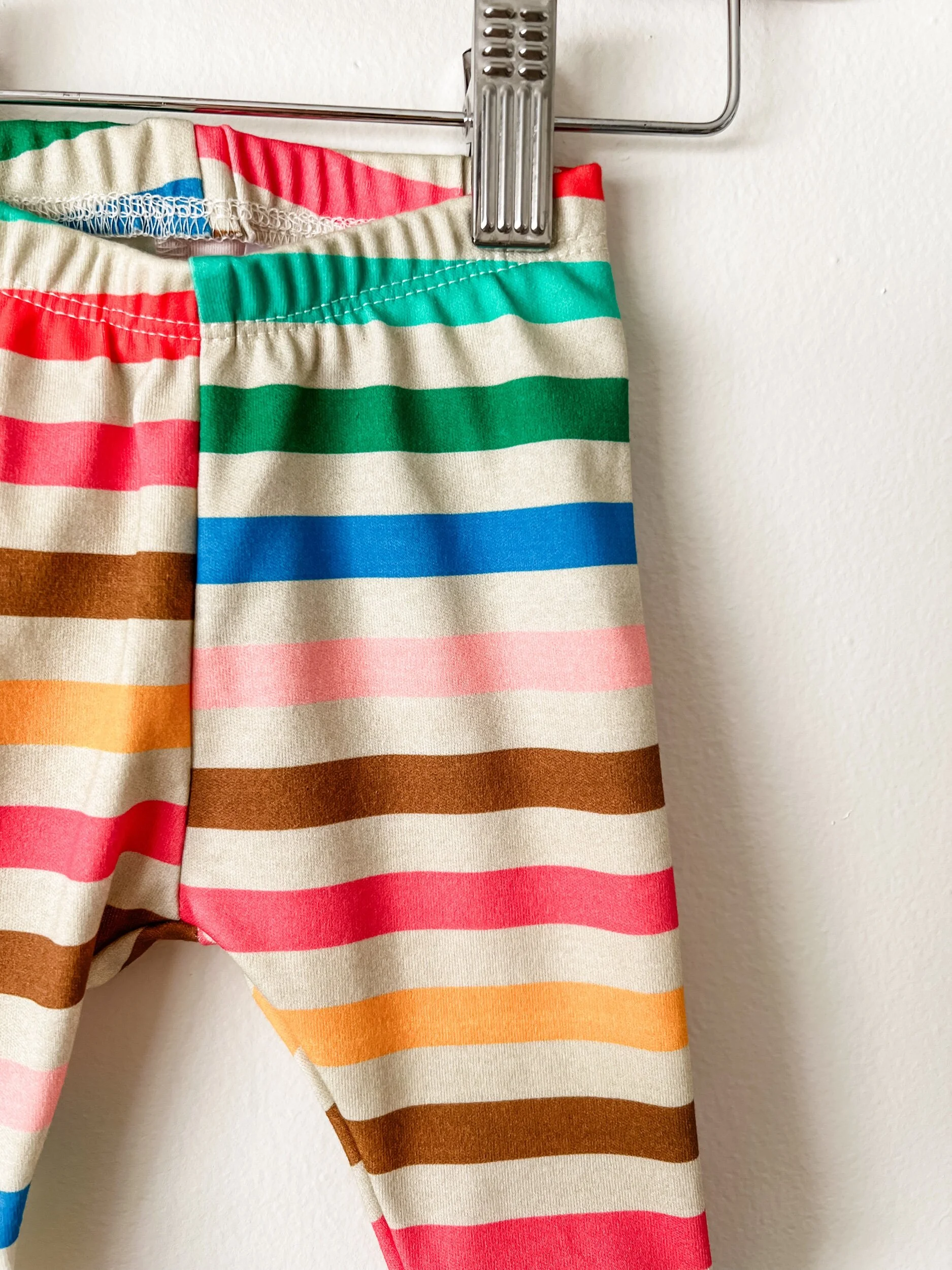 baby pants in rainbow colored stripes