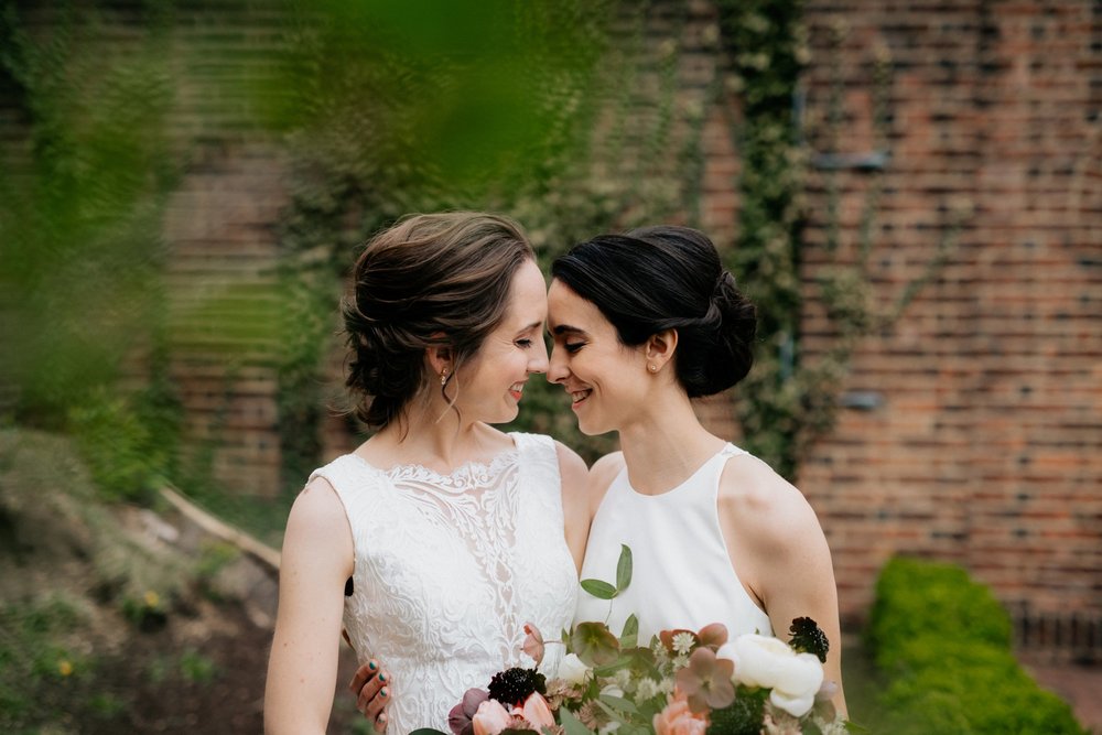 Same Sex Lesbian Wedding at the Penn Museum with Iconic Portraits at Franklin Field in Philadelphia, PA