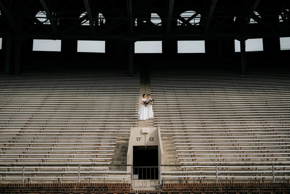 Same Sex Lesbian Wedding at the Penn Museum with Iconic Portraits at Franklin Field in Philadelphia, PA