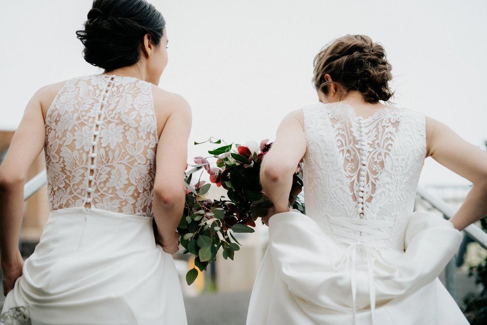 Same Sex Lesbian Wedding at the Penn Museum with Iconic Portraits at Franklin Field in Philadelphia, PA