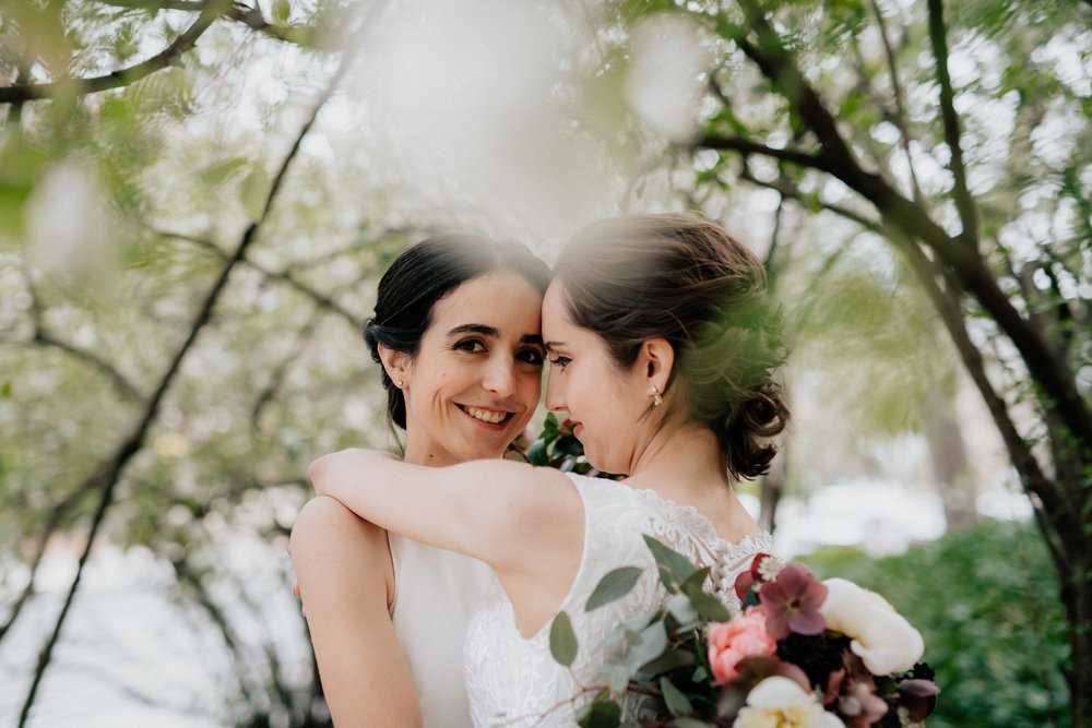 Same Sex Lesbian Wedding at the Penn Museum with Iconic Portraits at Franklin Field in Philadelphia, PA