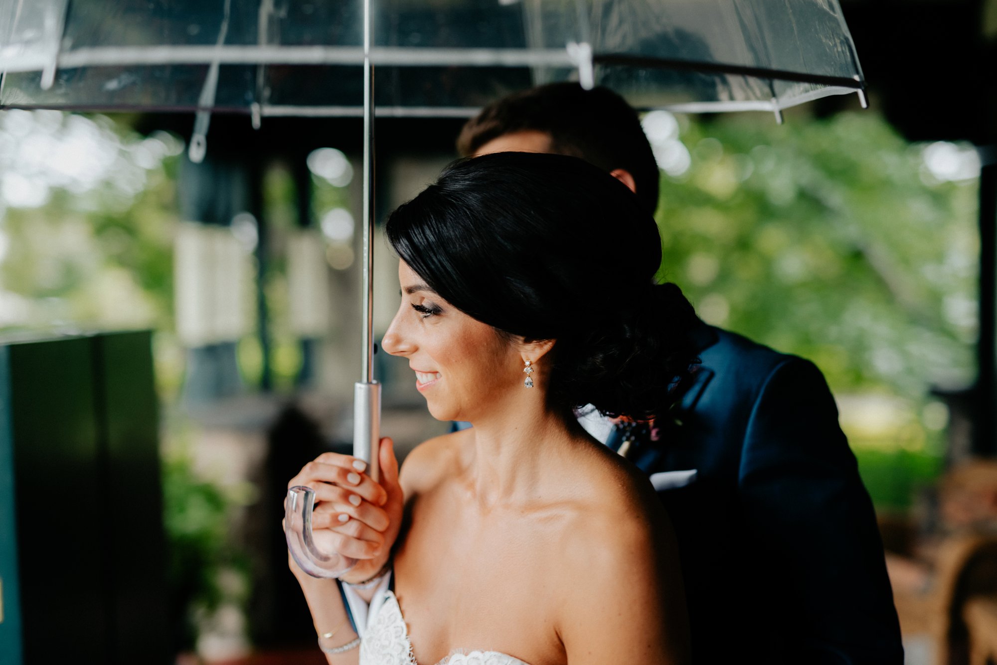 Lush Rainy Wedding at Knowlton Mansion in Philadelphia PA Moody Shadows and Umbrella Portraits