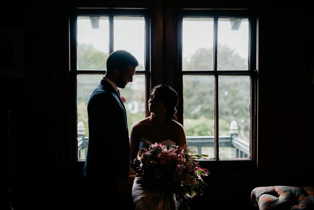 Lush Rainy Wedding at Knowlton Mansion in Philadelphia PA Moody Shadows and Umbrella Portraits