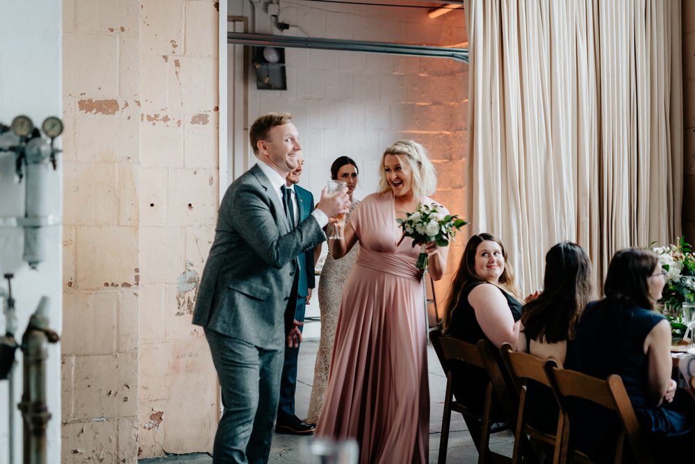 Stylish Philadelphia Wedding with preparations at Stay Lokal Bok and AirBnb and a Bok Building Rooftop Ceremony Grooms Fashion