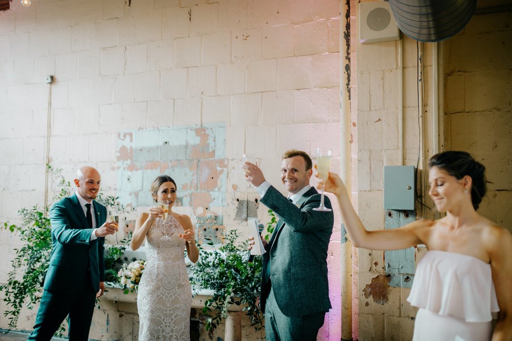 Stylish Philadelphia Wedding with preparations at Stay Lokal Bok and AirBnb and a Bok Building Rooftop Ceremony Grooms Fashion