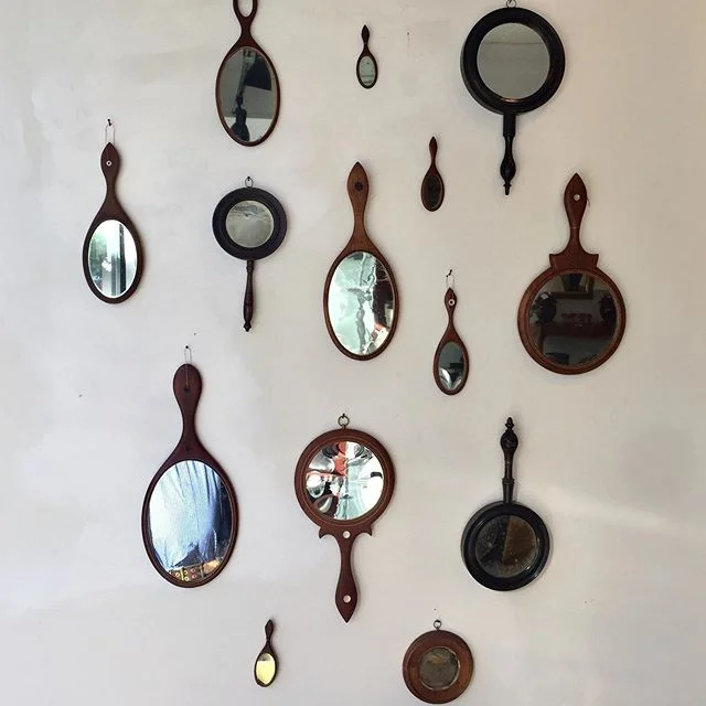Collection of 19th C Shaker and Shaker-style hand mirrors.