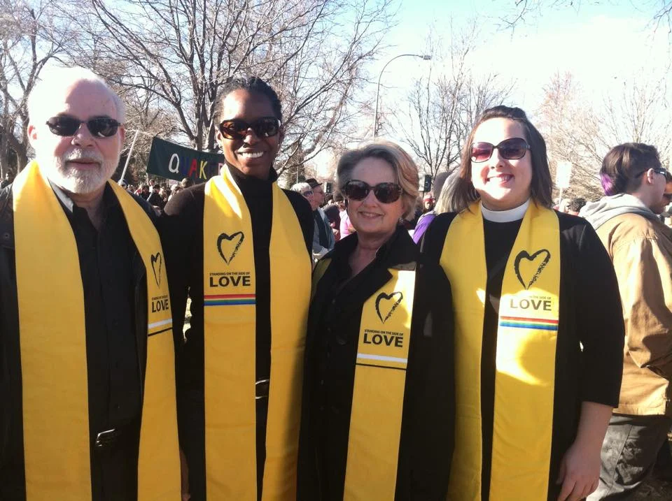 UU Clergy in Colorado, including Rev. Alicia Forde and Rev. Kierstin Homblette stand on the side of love in Colorado