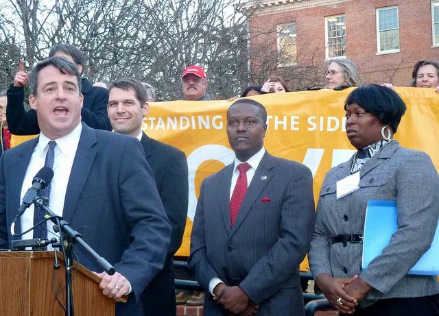 Maryland Attorney General Doug Gansler, Sen. Majority Leader Rob Garagiola, Darrell Carrington, & Sandy Rawls in front of the Annapolis State House