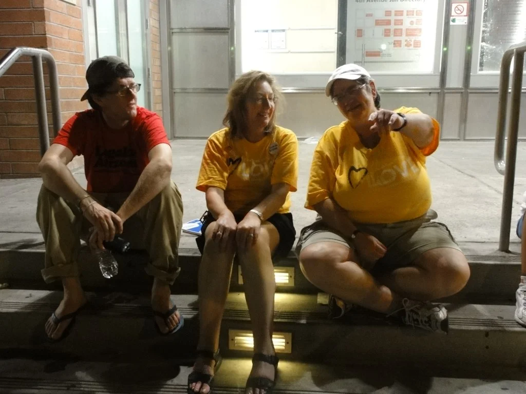 Former UUA Moderator Gini Courter with UUA Congregational Advocacy ad Witness Director Susan Leslie sit outside the Maricopa County jail during the National Day of Non-Compliance in July 2010