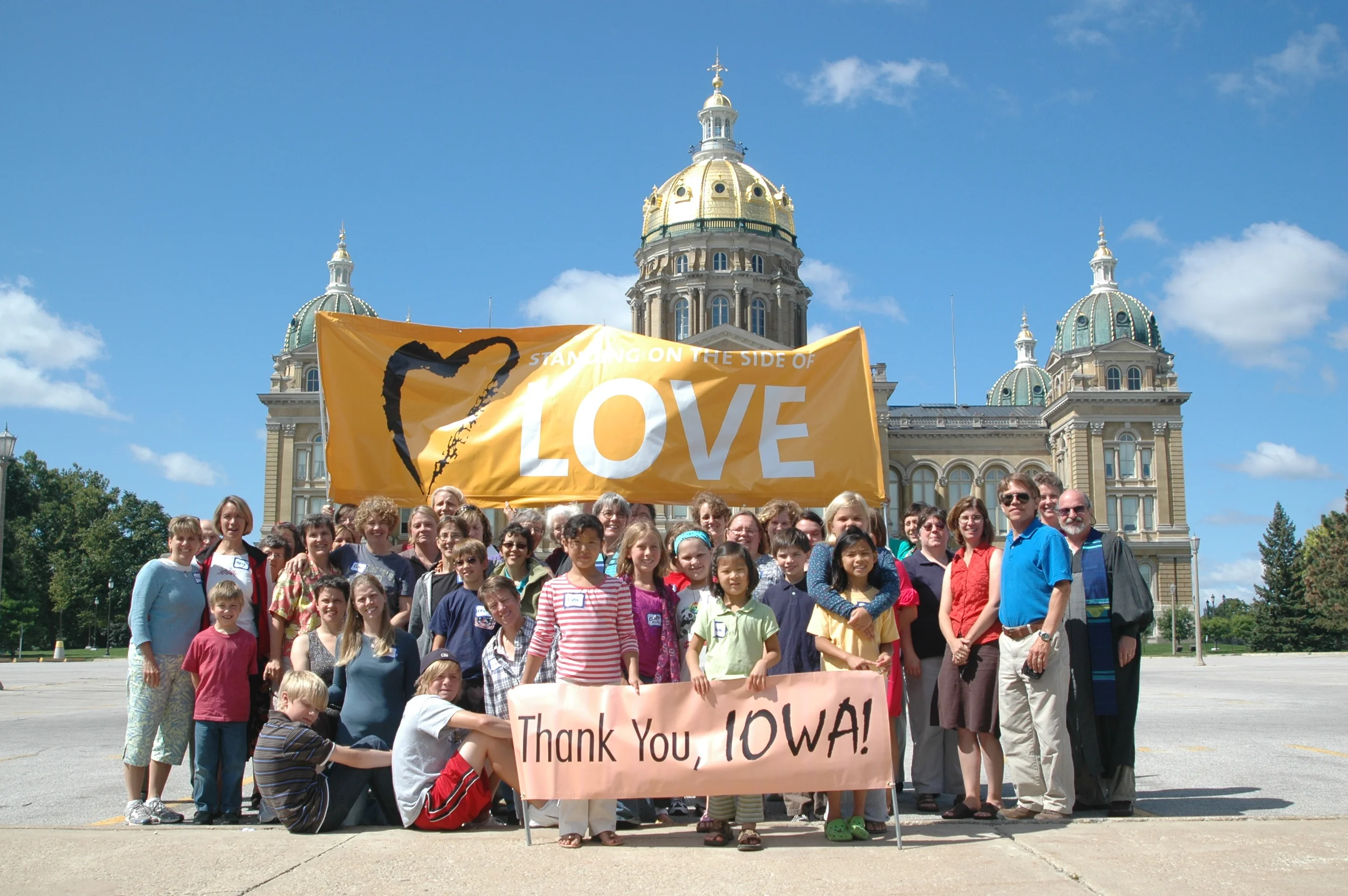Love Supporters stand outside the Iowa Statehouse shortly after winning marriage equality in 2009.