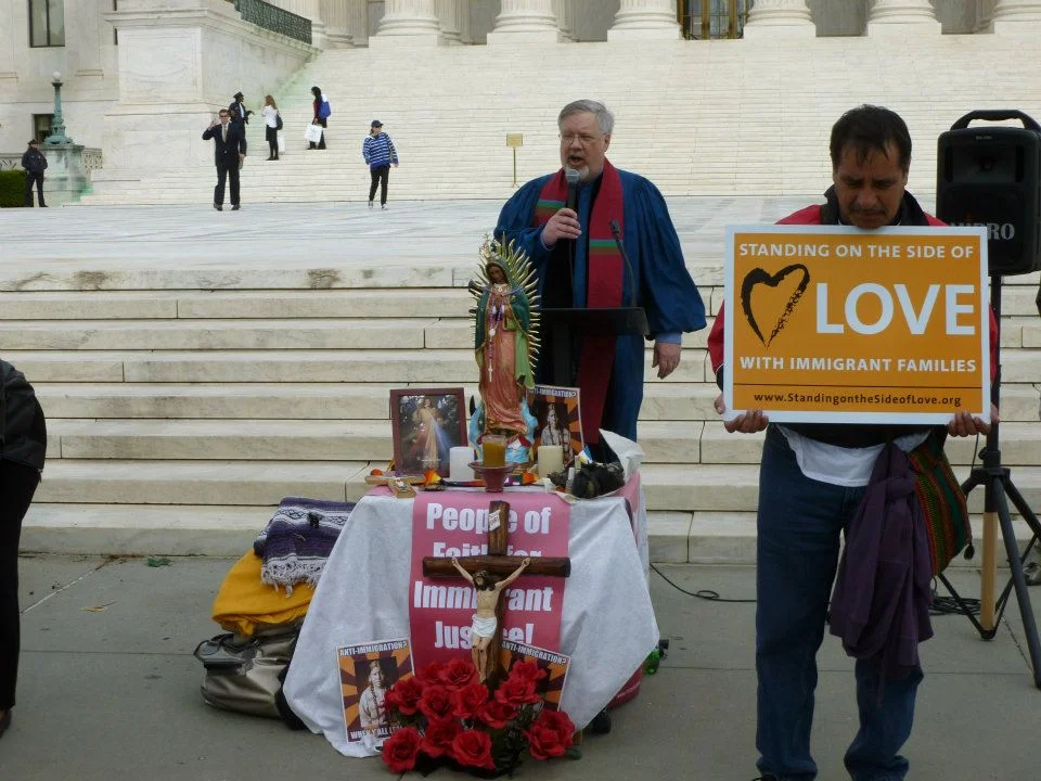 Rev. Craig Roshaven speaking at an Immigration Rally