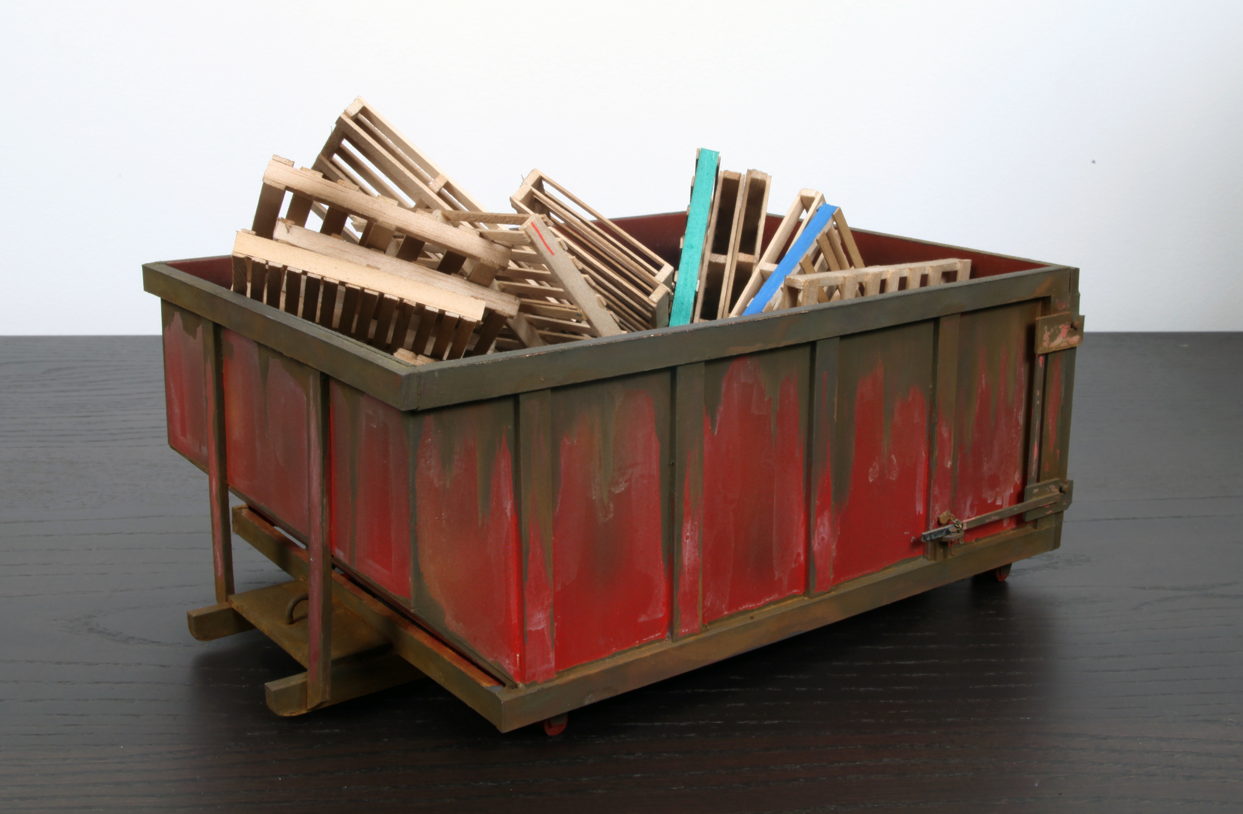 Red Dumpster with 30 pallets - SOLD