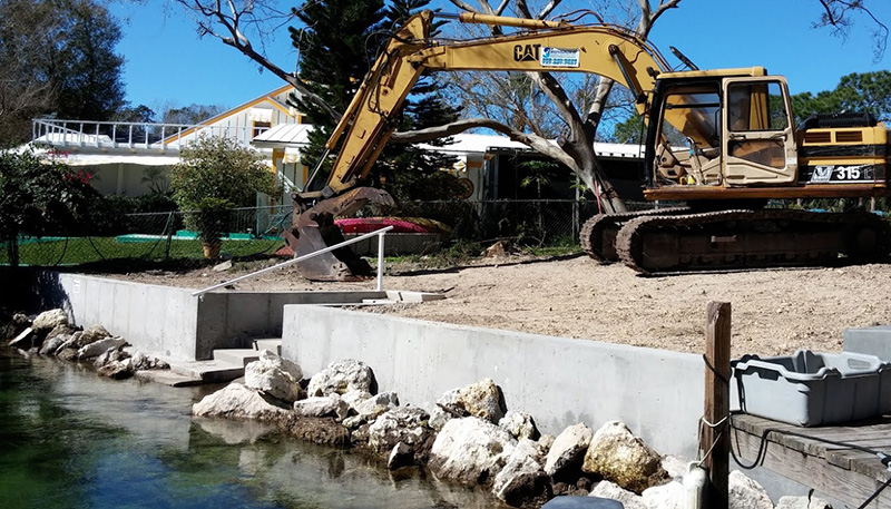 Concrete and Riprap Seawall with Escavator.jpg
