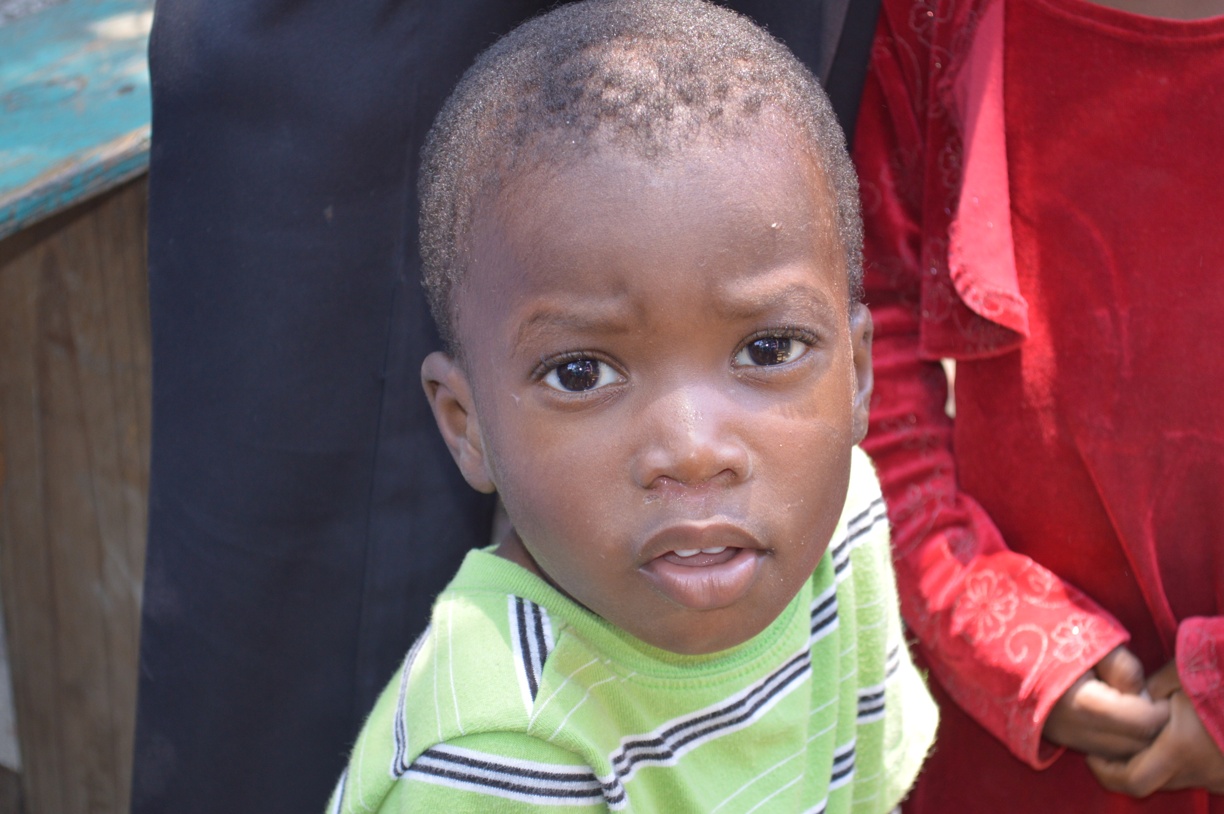 This is Davensky. He's four years old. He's the smallest child living with Federick. Federick's son is younger, but Davensky is smaller.