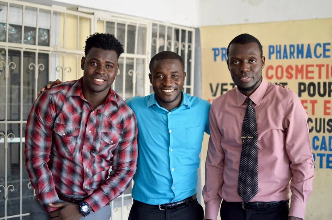 Polo (Director of Community Development), Steeve (Director of Church Ministry Development), and Vorb (Director of Economic Development).