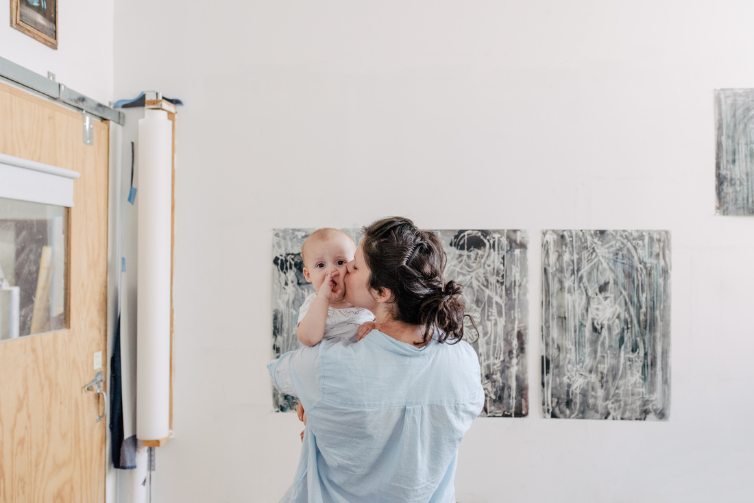 Portrait of Diana Al-Hadid and her son in her Brooklyn studio by Daniel Dorsa for Artsy.