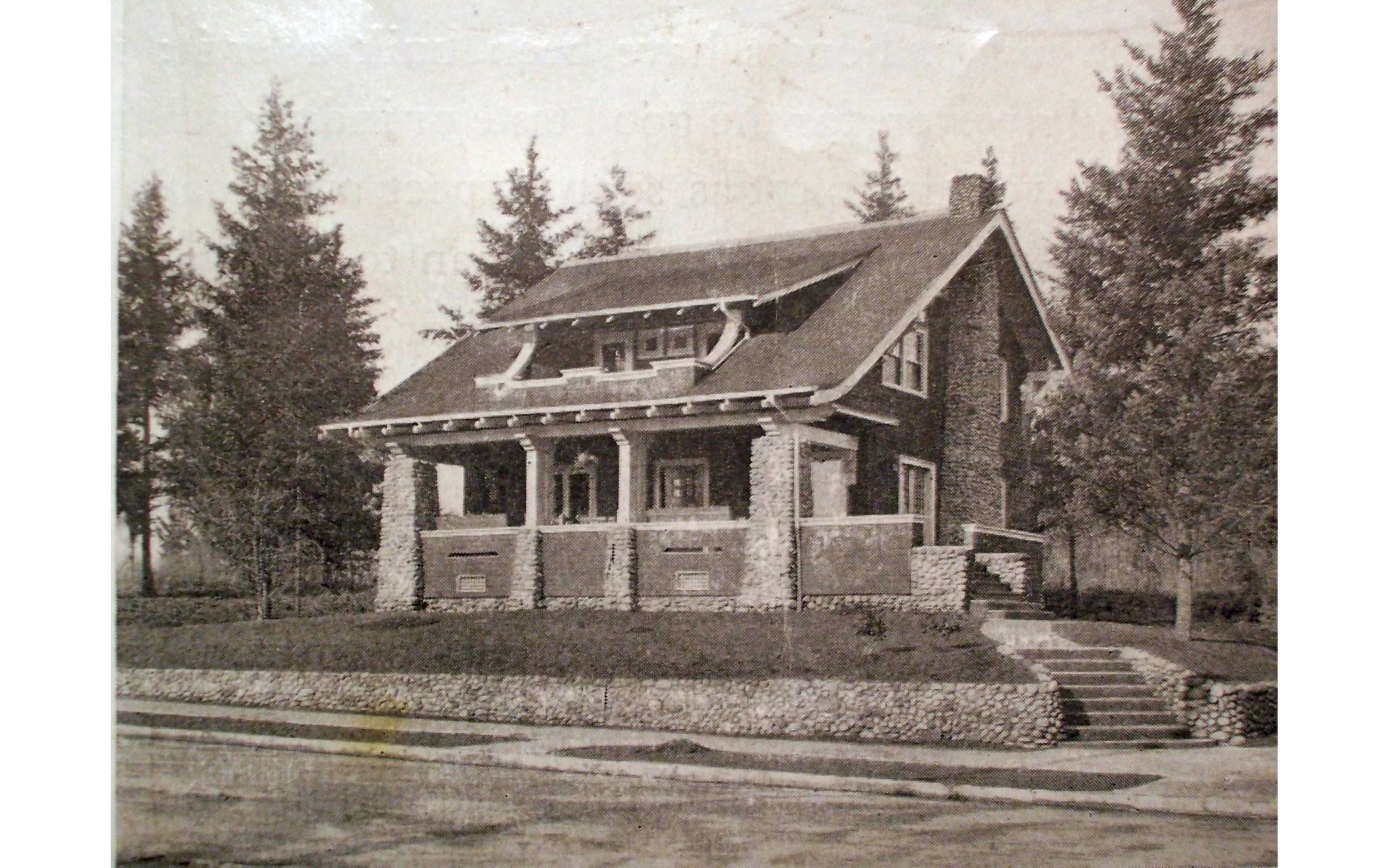  House built for Gertrude and Joseph Harker Smith, 1831 NE Brazee, ca. 1907.&nbsp; A. H. Faber architect.&nbsp; The river rock retaining wall, porch, and chimney are still extant.&nbsp; 