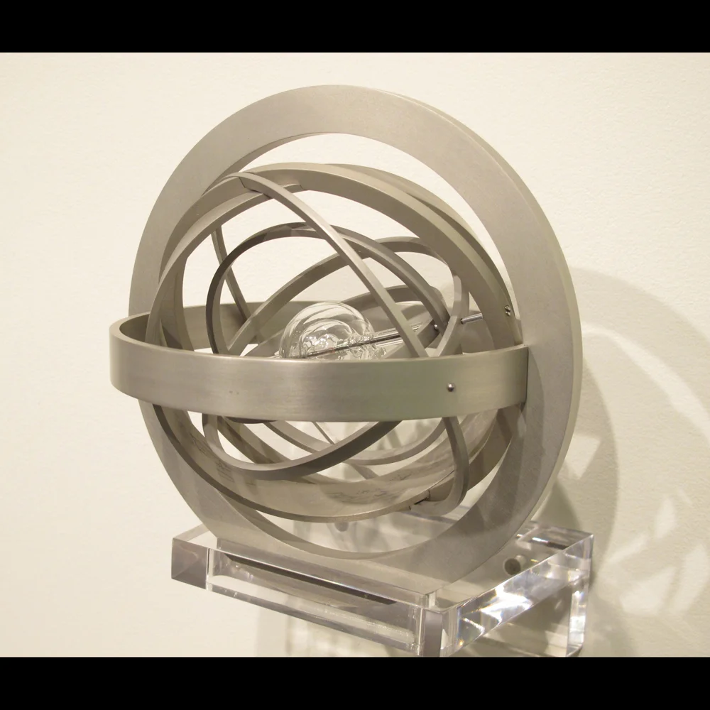 Armillary Sphere (2011), 8x8x8 inches, aluminum and borosilicate glass