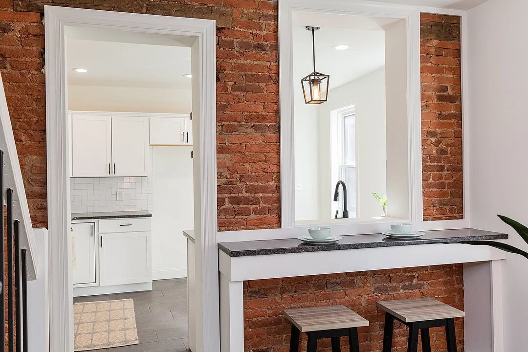 I love the design of this breakfast bar in this Lancaster City home. Such a beautiful and cleverly designed home that truly maximizes the amount of space this home has. And talk about the natural light pouring in through almost all sides of this home