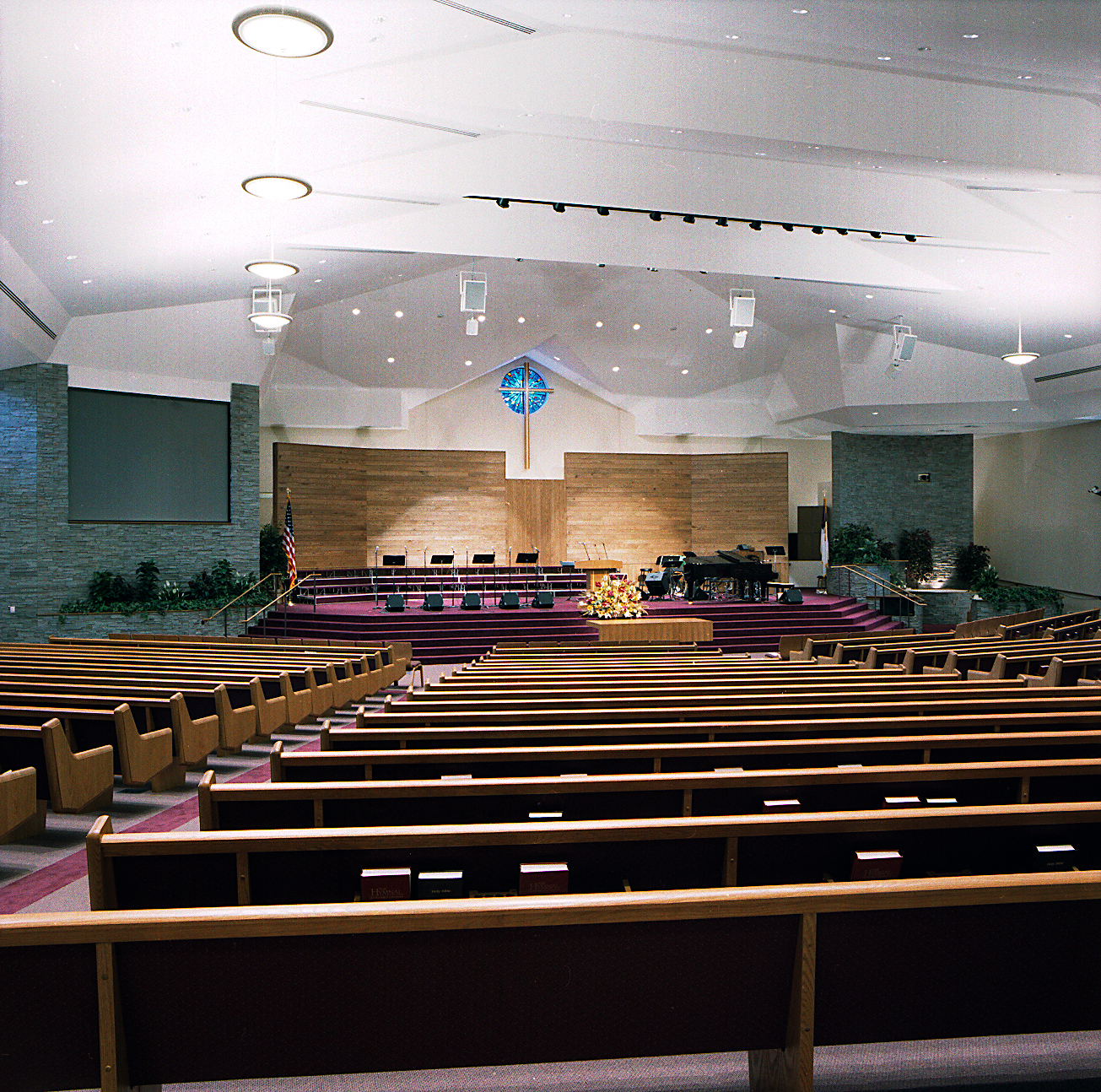 a more traditional evangelical congregation, loudonville community church near albany, ny wanted a space to accommodate both classical instruments and voice with natural (space) acoustics and amplified sound for contemporary worship. This 900 seat space is equipped with State of the art Audio, video and lighting while preserving a more traditional 'church' appearance.