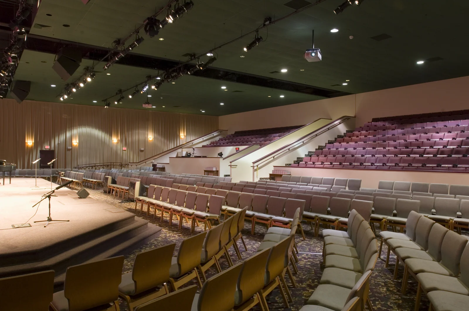 a very unique adaptive reuse, bethel, the church at franklin mills, occupies a former multi-plex cinema. this phase 1 auditorium combined two theaters to create a 600 seat phase 1. two more vacant theaters on either side will provide an additional 600 seats in a semi-circle arrangement for a total capacity of 1,200