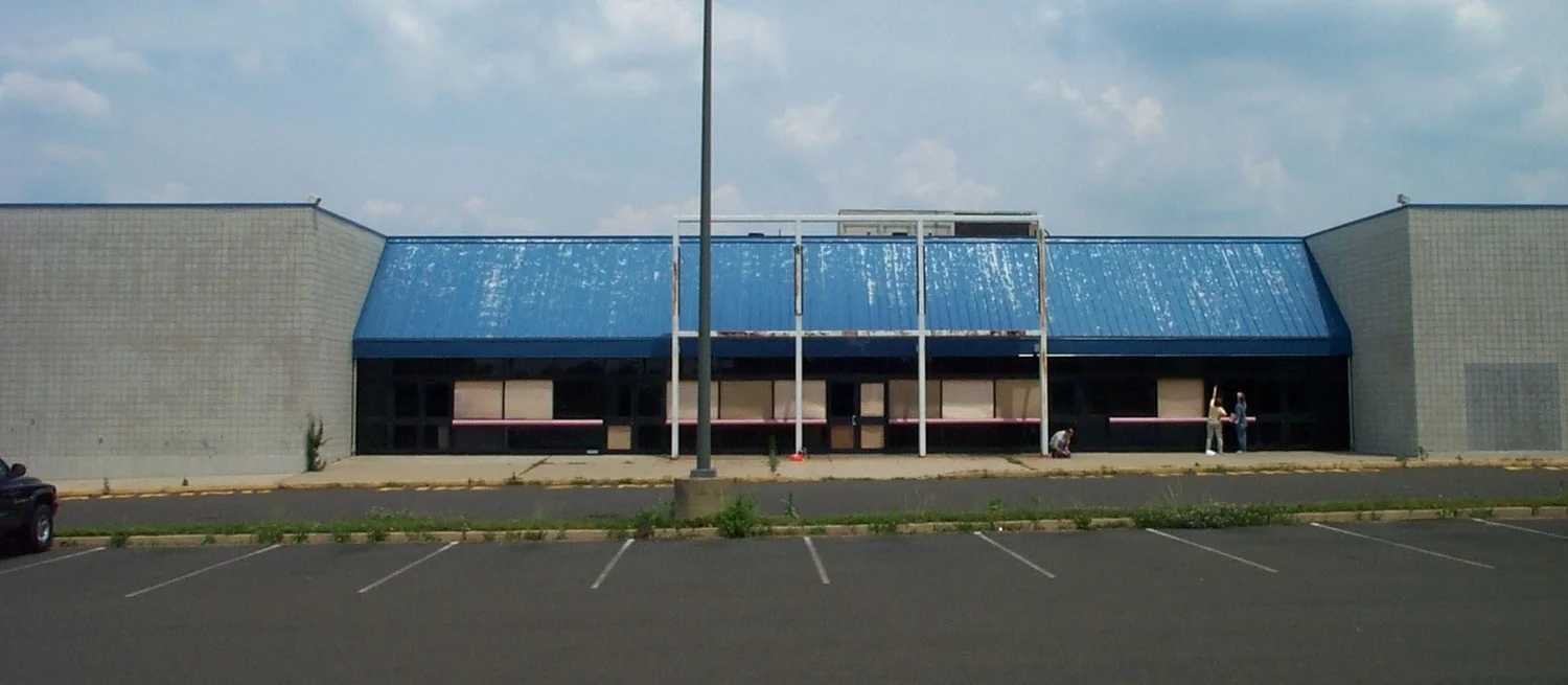 this vacant, dilapidated multiplex cinema at the largest mall in Pennsylvania  gave bethel - the church at franklin mills ( phila., pa) a great place to grow and expand incrementally. 