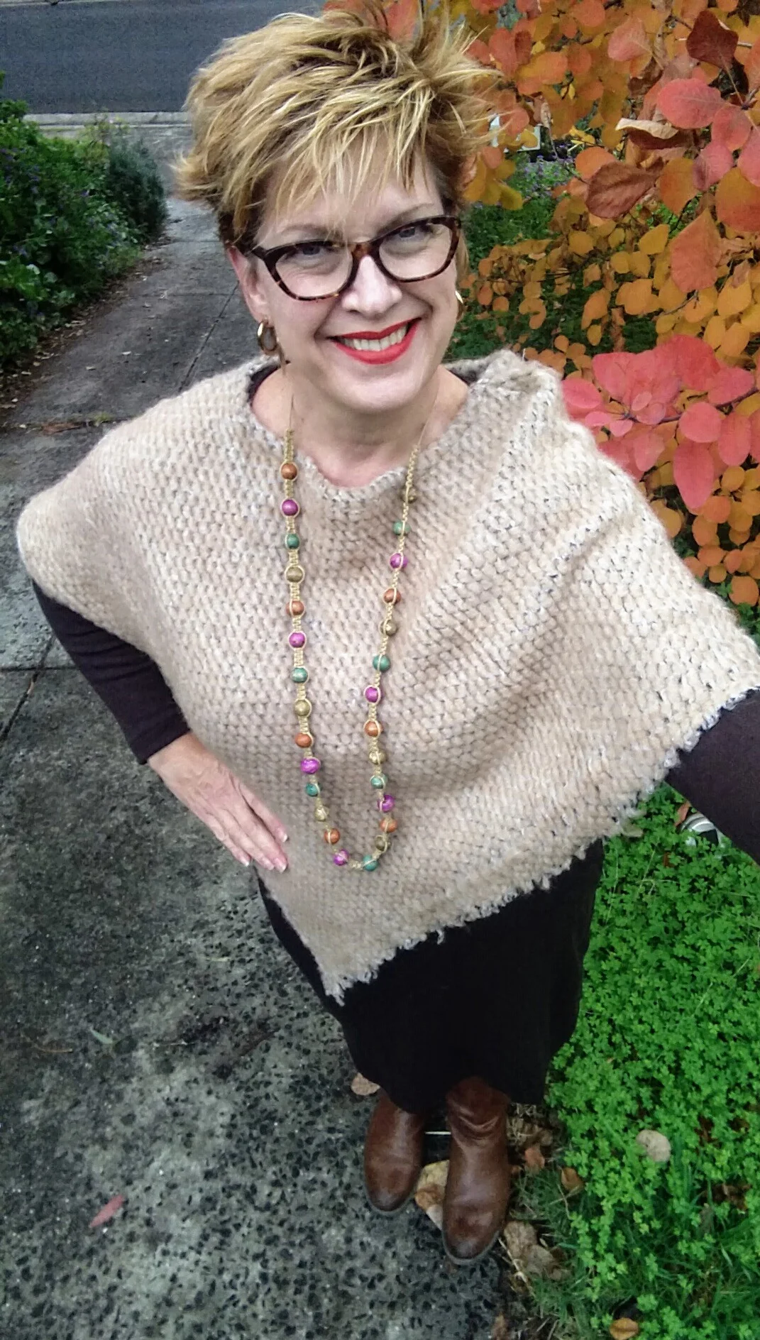 Adding a muted Necklace makes this poncho work