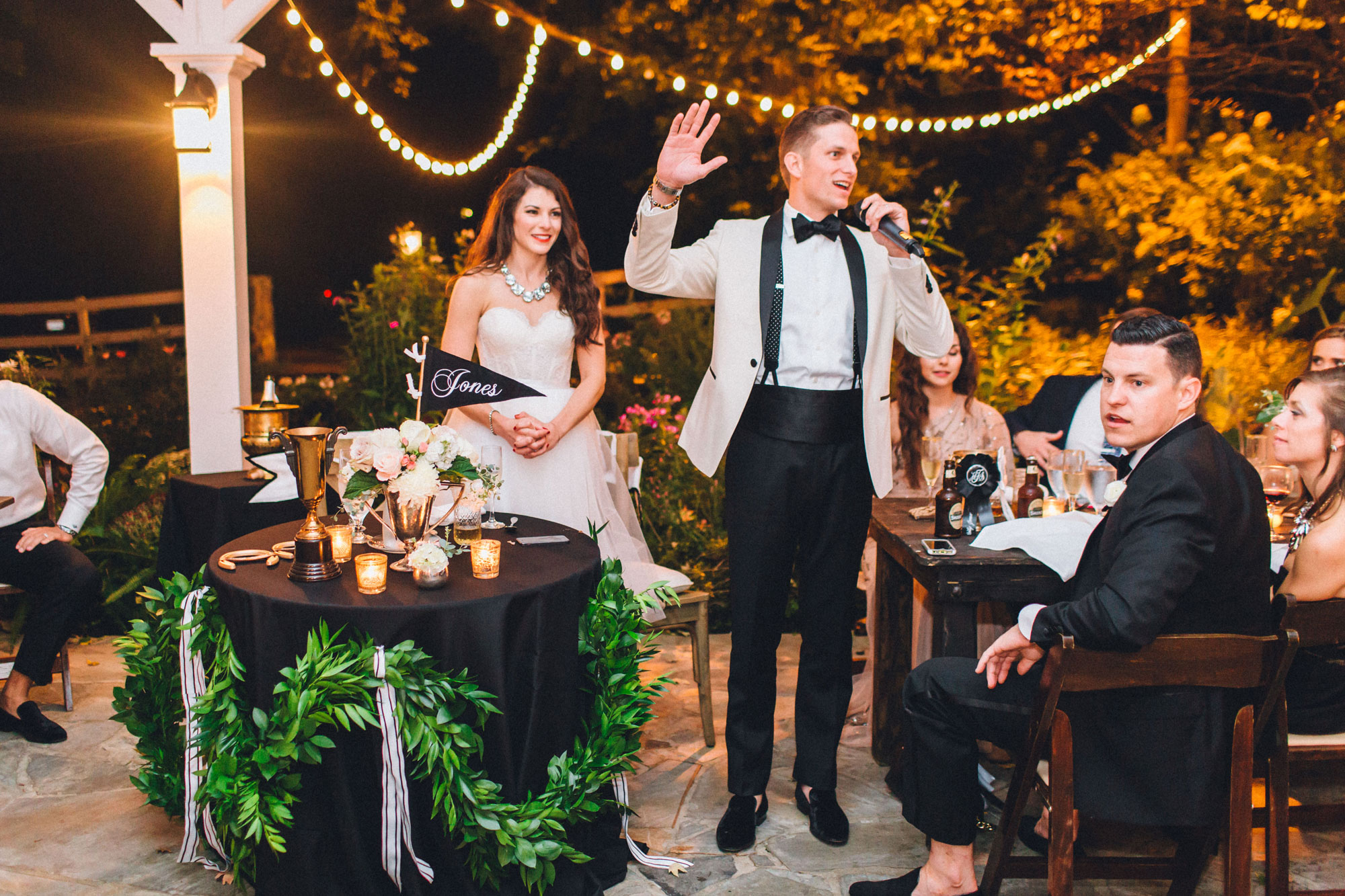 Me & Mr. Jones Wedding, Groom Thanking Guests, Table with Greenery, Black Tablecloths, Farm Tables, Rustic Glam Wedding Decor