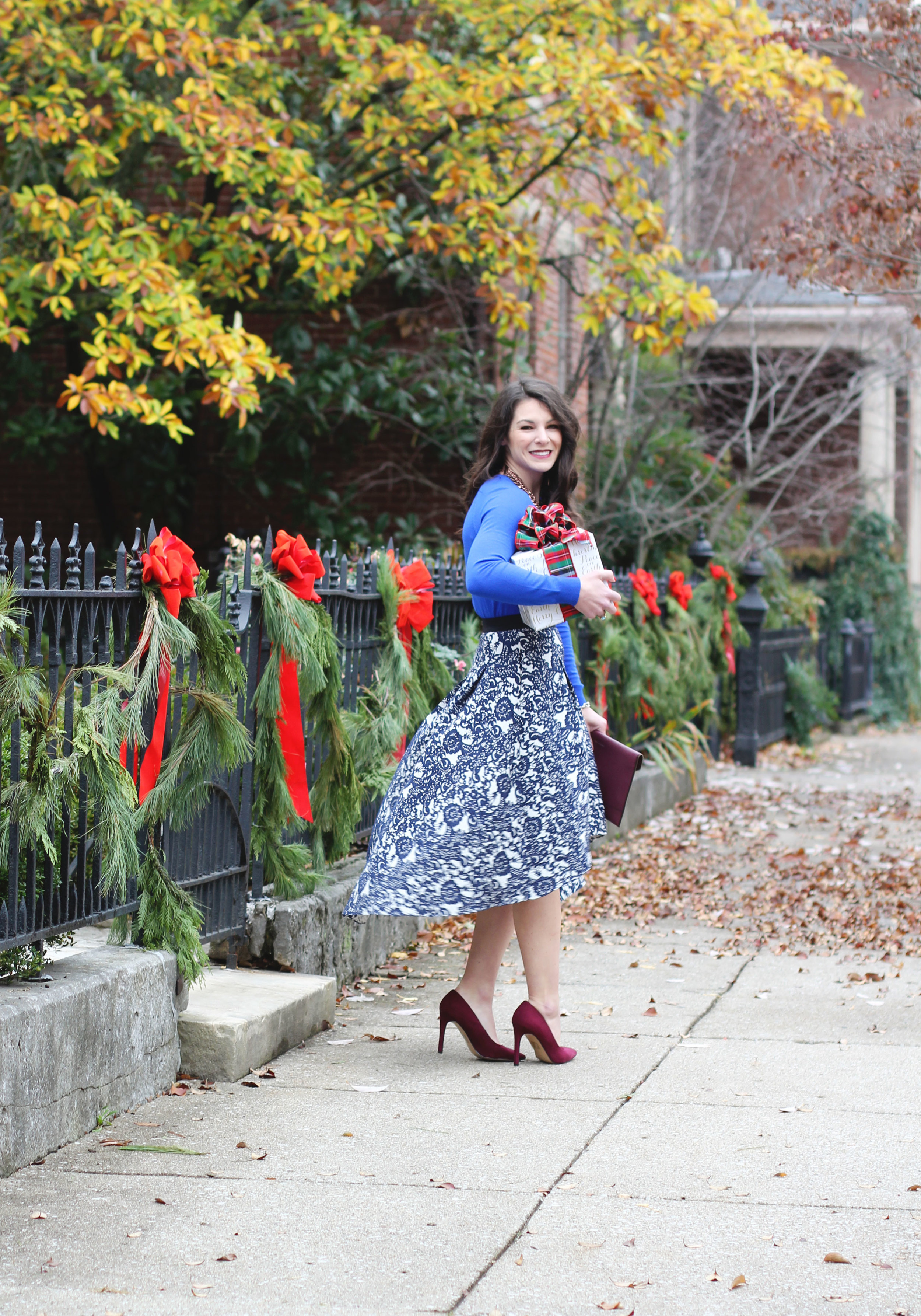 Holiday Outfit, Christmas Party Outfit, Anthropologie Vespertine High Low Skirt, Target Cobalt Blue Sweater, Wine Pumps, Rebecca Minkoff Envelope Clutch, Baublebar Courtney Bib Neclace
